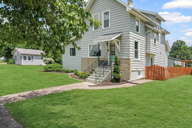 103 S Locust St, Loda, IL 60948 - american foursquare style home with a chimney