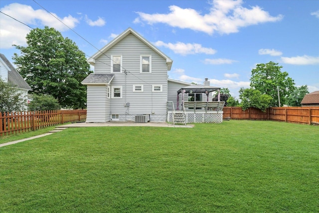 103 S Locust St, Loda, IL 60948 - back of property featuring a gazebo, a patio area, a fenced backyard, and a shingled roof