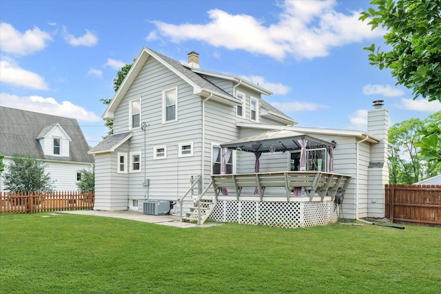 103 S Locust St, Loda, IL 60948 - rear view of house with a chimney, a gazebo, a patio area, and a deck