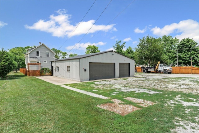 103 S Locust St, Loda, IL 60948 - rear view of house with a garage and an outdoor structure