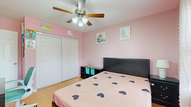 1005 N Dovington Dr, Hoffman Estates, IL 60169 - bedroom with light wood-style flooring, a closet, and a ceiling fan