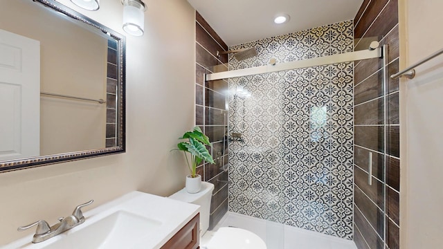 1005 N Dovington Dr, Hoffman Estates, IL 60169 - bathroom with vanity, a shower stall, and recessed lighting