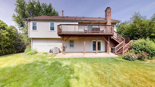 1005 N Dovington Dr, Hoffman Estates, IL 60169 - back of house with a lawn, a patio, a deck, and a chimney