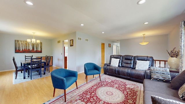 1005 N Dovington Dr, Hoffman Estates, IL 60169 - living area featuring a chandelier, light wood-style floors, and recessed lighting
