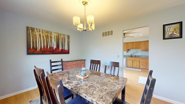 1005 N Dovington Dr, Hoffman Estates, IL 60169 - dining space with a chandelier, light wood-style flooring, and ceiling fan