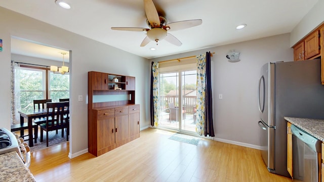 1005 N Dovington Dr, Hoffman Estates, IL 60169 - kitchen with stainless steel appliances, light wood-type flooring, a ceiling fan, brown cabinetry, and recessed lighting