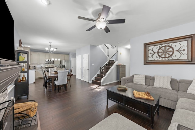 2503 Red Hawk Ridge Ct, Aurora, IL 60503 - living area featuring a chandelier, stairway, ceiling fan, and dark wood-style flooring