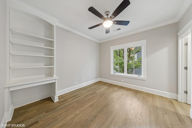 606 S Washington St, Hinsdale, IL 60521 - unfurnished bedroom featuring wood finished floors, ornamental molding, and a ceiling fan