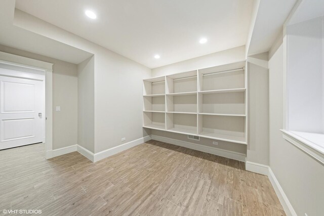 606 S Washington St, Hinsdale, IL 60521 - unfurnished room with wood finished floors and recessed lighting