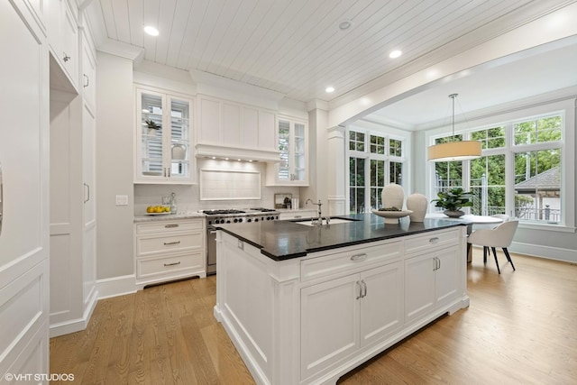 606 S Washington St, Hinsdale, IL 60521 - kitchen featuring high end stainless steel range, light wood finished floors, white cabinetry, ornamental molding, and recessed lighting