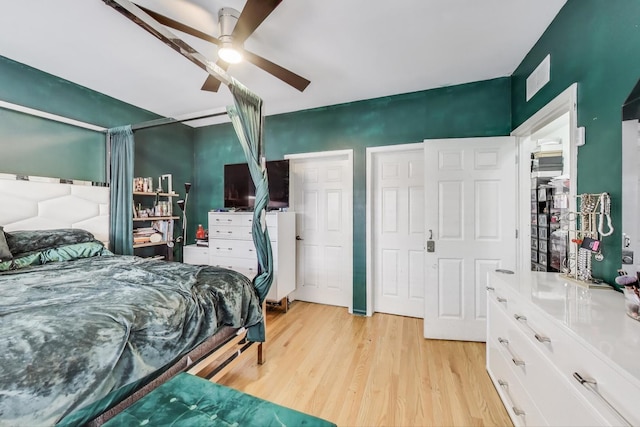 1900 N Laramie Ave, Chicago, IL 60639 - bedroom featuring light wood-type flooring and ceiling fan