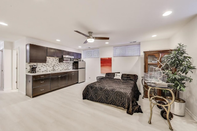 1900 N Laramie Ave, Chicago, IL 60639 - bedroom featuring fridge, recessed lighting, light wood-style flooring, and ceiling fan