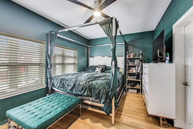 1900 N Laramie Ave, Chicago, IL 60639 - bedroom with wood finished floors and a ceiling fan
