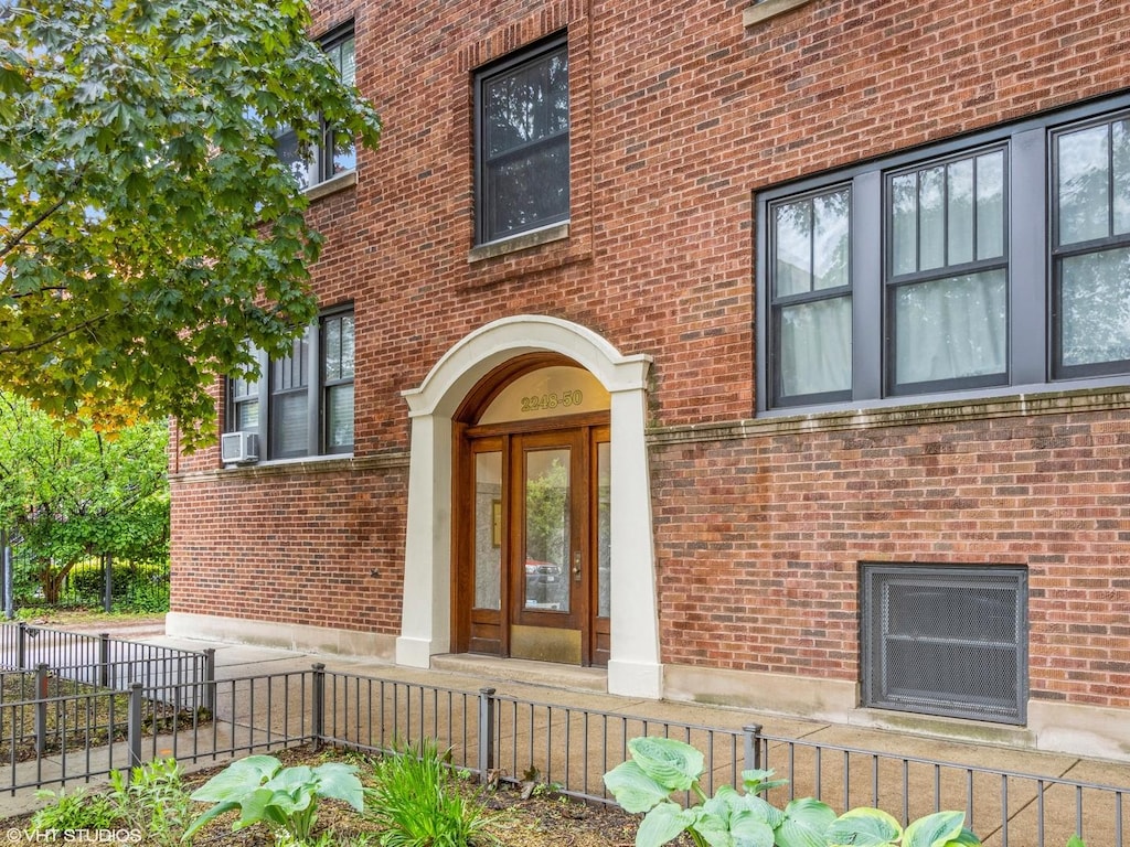 2250 N Dayton St Unit 2, Chicago, IL 60614 - entrance to property featuring brick siding and cooling unit