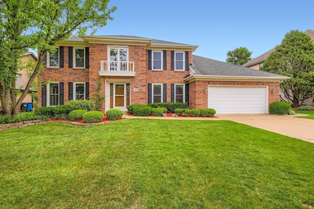 454 Hemlock Ln, Roselle, IL 60172 - colonial-style house with a garage, driveway, a front lawn, brick siding, and roof with shingles