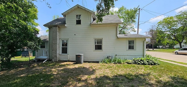 909 W 6th St, Dixon, IL 61021 - rear view of property with a yard and roof with shingles