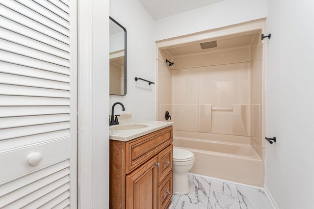 741 Gates St, West Chicago, IL 60185 - bathroom featuring vanity, tub / shower combination, and marble finish floors