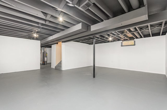 741 Gates St, West Chicago, IL 60185 - below grade area featuring stairs and water heater