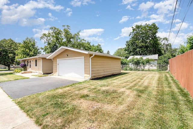 741 Gates St, West Chicago, IL 60185 - garage featuring driveway