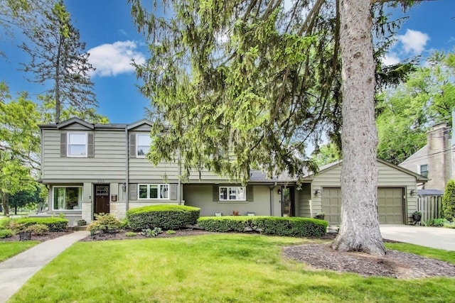 1311 E Woodford Pl, Arlington Heights, IL 60004 - view of front of home featuring a front yard, driveway, and a garage