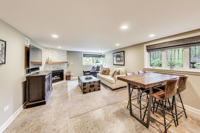 1311 E Woodford Pl, Arlington Heights, IL 60004 - living room featuring a fireplace and recessed lighting