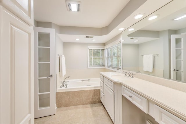 1311 E Woodford Pl, Arlington Heights, IL 60004 - full bathroom with vanity, a garden tub, tile patterned flooring, and recessed lighting