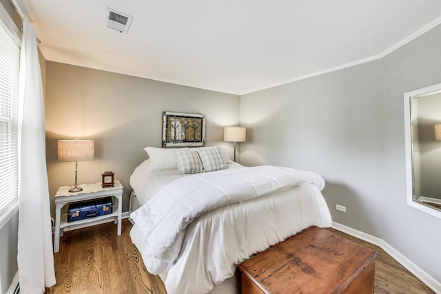 1311 E Woodford Pl, Arlington Heights, IL 60004 - bedroom with wood finished floors and baseboards