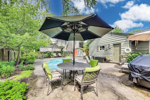 1311 E Woodford Pl, Arlington Heights, IL 60004 - fenced backyard featuring a patio, a shed, outdoor dining area, and grilling area