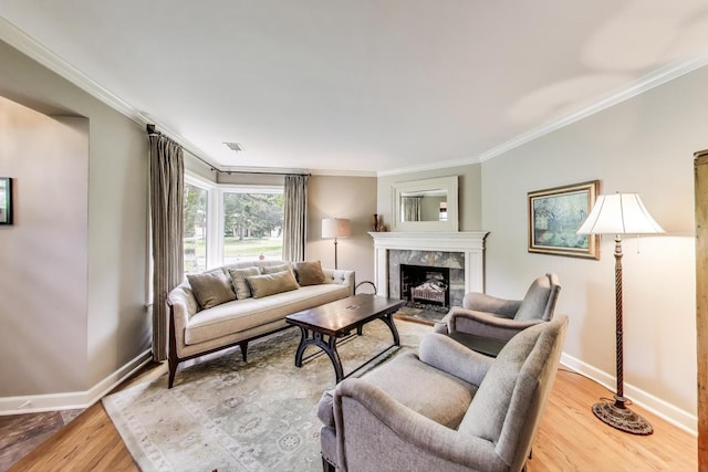 1311 E Woodford Pl, Arlington Heights, IL 60004 - living area with ornamental molding, a fireplace, and wood finished floors