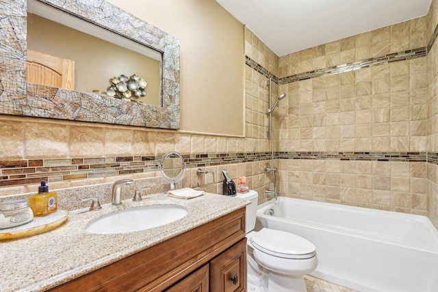 318 10th St, Wheeling, IL 60090 - bathroom featuring shower / tub combination, vanity, and tile walls