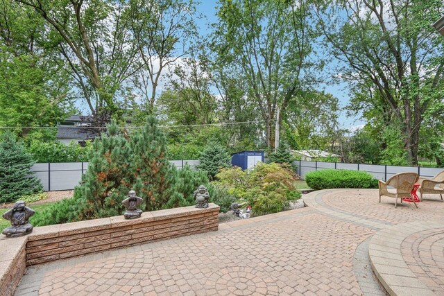 318 10th St, Wheeling, IL 60090 - fenced backyard featuring a patio