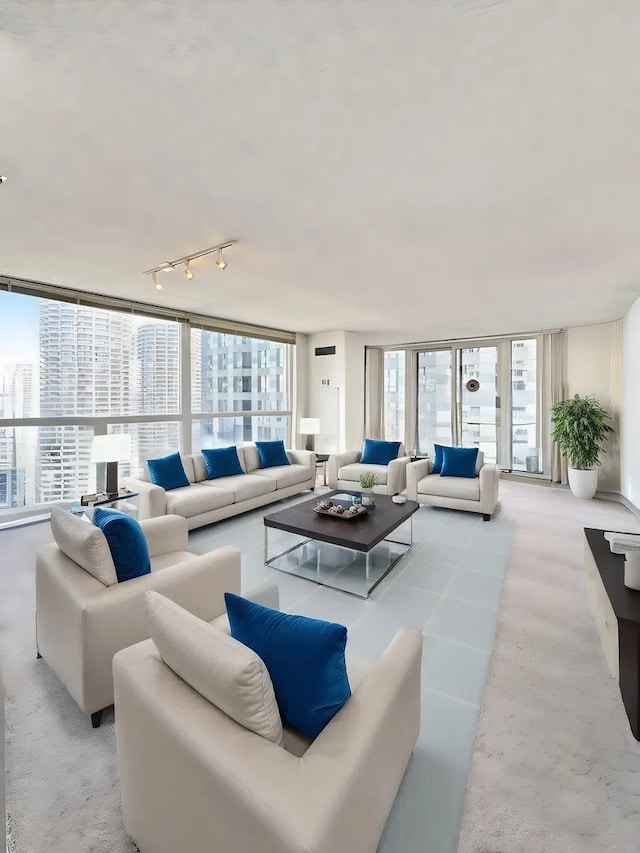 200 N Dearborn St Unit 4306, Chicago, IL 60601 - living room with rail lighting and light carpet