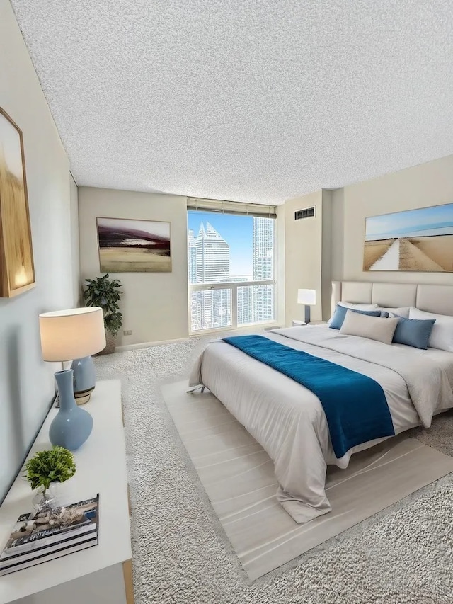 200 N Dearborn St Unit 4306, Chicago, IL 60601 - bedroom with a textured ceiling and carpet floors