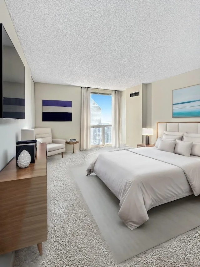 200 N Dearborn St Unit 4306, Chicago, IL 60601 - bedroom with a textured ceiling