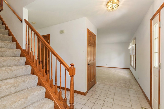 905 Pember Cir, West Dundee, IL 60118 - staircase featuring carpet floors and baseboards