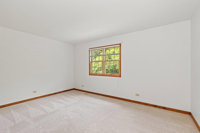 905 Pember Cir, West Dundee, IL 60118 - unfurnished room with light colored carpet and baseboards