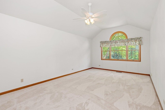 905 Pember Cir, West Dundee, IL 60118 - empty room with vaulted ceiling, ceiling fan, and carpet floors