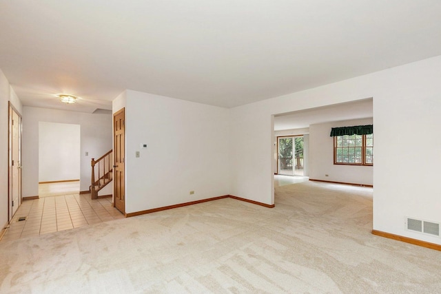 905 Pember Cir, West Dundee, IL 60118 - empty room with light carpet and stairs
