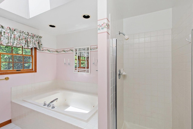 905 Pember Cir, West Dundee, IL 60118 - full bathroom featuring a stall shower, a jetted tub, and a skylight