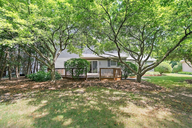 905 Pember Cir, West Dundee, IL 60118 - back of property featuring a wooden deck and a yard