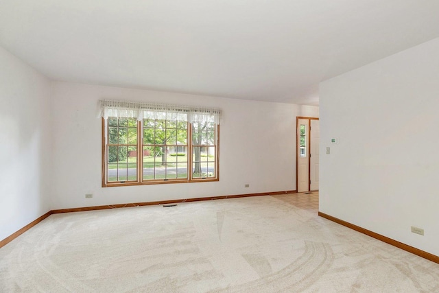 905 Pember Cir, West Dundee, IL 60118 - carpeted spare room featuring baseboards