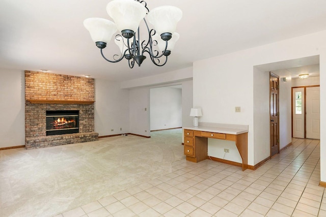 905 Pember Cir, West Dundee, IL 60118 - unfurnished living room with a fireplace, a chandelier, and light colored carpet