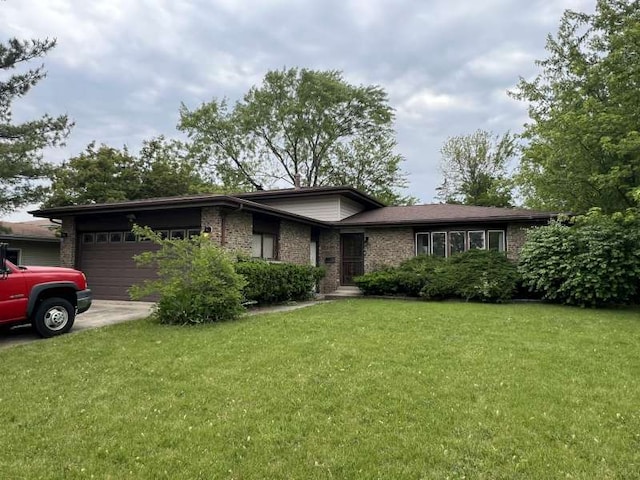 1116 Amherst Ln, University Park, IL 60484 - view of front of property with an attached garage, a front lawn, driveway, and brick siding