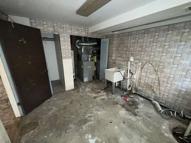 1116 Amherst Ln, University Park, IL 60484 - below grade area featuring heating unit and a sink
