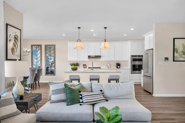 311 Snowdrop Ln, Elgin, IL 60124 - living room with wood finished floors and recessed lighting