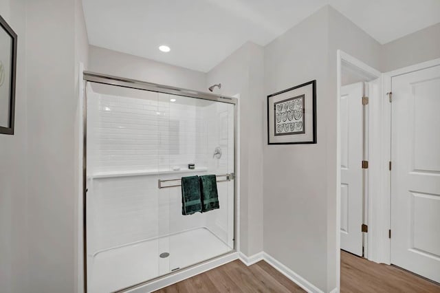 311 Snowdrop Ln, Elgin, IL 60124 - full bathroom with wood finished floors, a stall shower, and recessed lighting