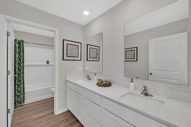 311 Snowdrop Ln, Elgin, IL 60124 - bathroom with double vanity, wood finished floors, and shower / bathtub combination