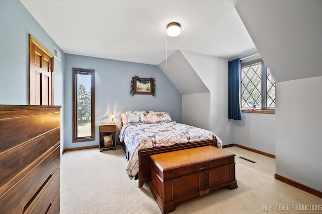 4S064 Hazelcrest Dr, Sugar Grove, IL 60554 - bedroom with light carpet, multiple windows, and lofted ceiling