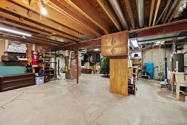 4S064 Hazelcrest Dr, Sugar Grove, IL 60554 - unfinished below grade area featuring a water pressure tank, gas water heater, and heating unit