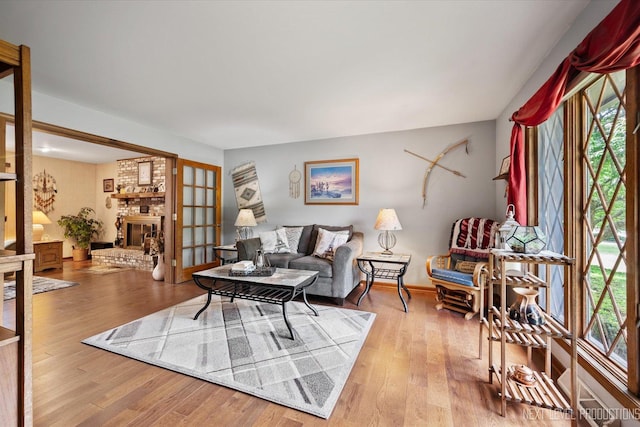 4S064 Hazelcrest Dr, Sugar Grove, IL 60554 - living area featuring wood finished floors and a brick fireplace